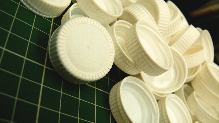 A small pile of bottle tops