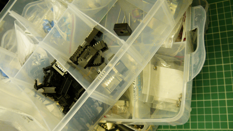 An organised tray of small electrical components