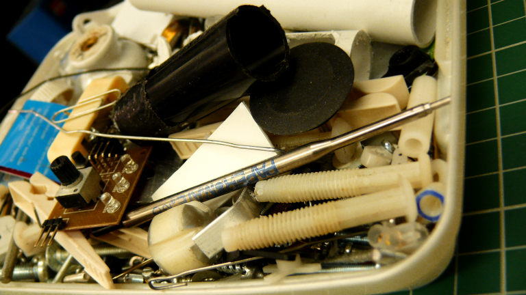 A tray with various tools and componenets